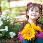 Baby Girl With Beautiful Flowers Photos
